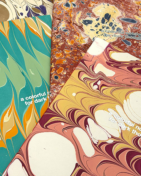 "Colorful notebook for dark thoughts"