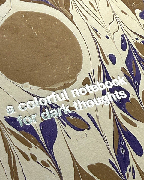 "Colorful notebook for dark thoughts"