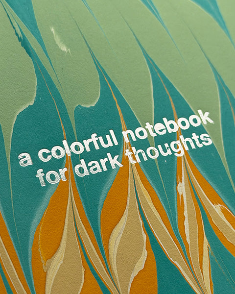 "Colorful notebook for dark thoughts"