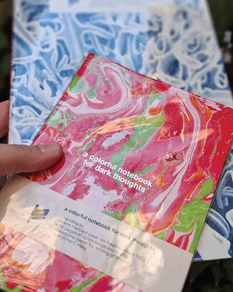 "Colorful notebook for dark thoughts"