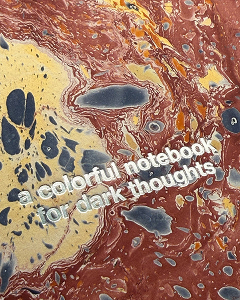 "Colorful notebook for dark thoughts"